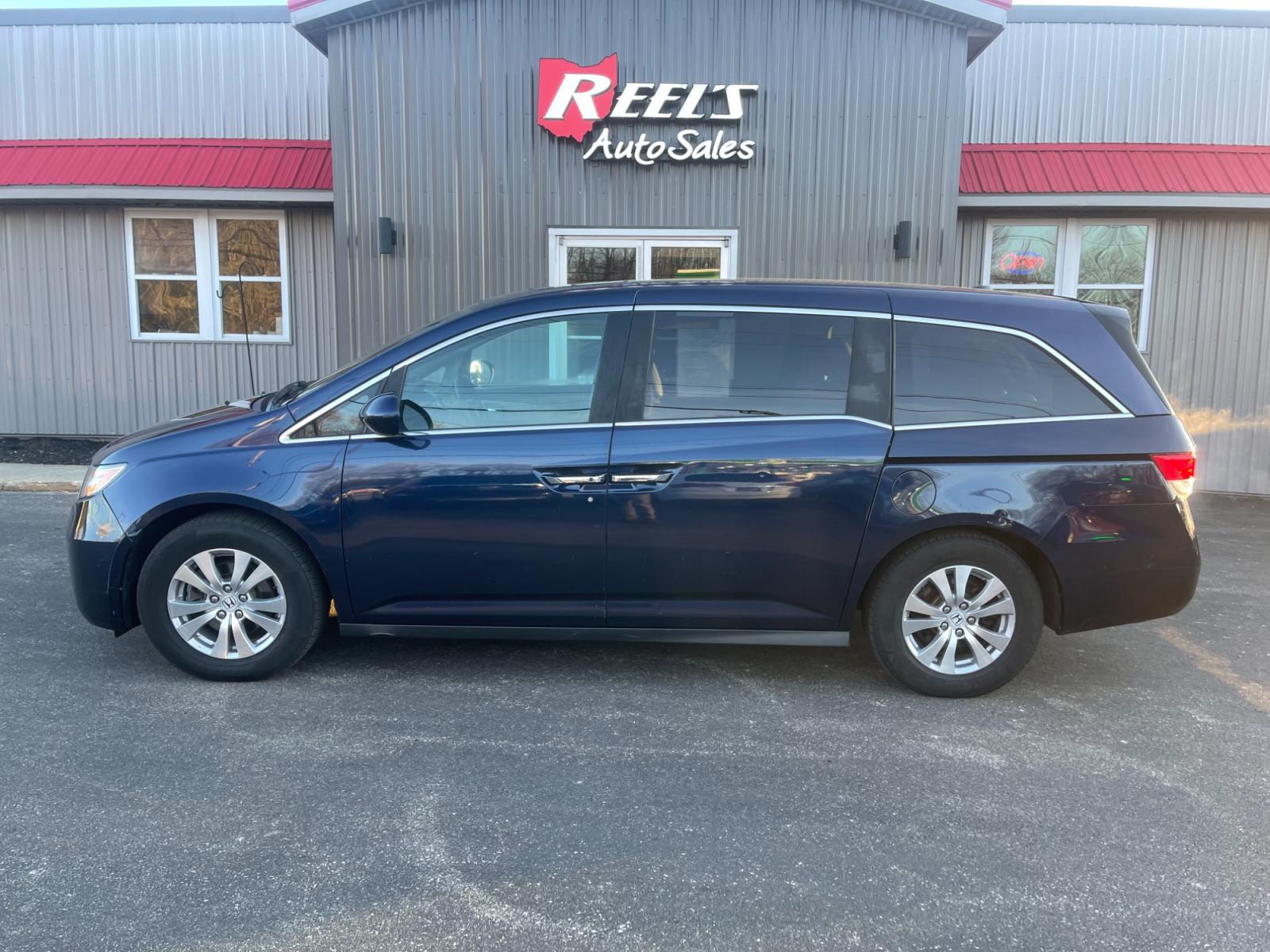 2015 Blue /Gray Honda Odyssey EX-L (5FNRL5H64FB) with an 3.5L V6 SOHC 24V engine, 6-Speed Automatic transmission, located at 11115 Chardon Rd. , Chardon, OH, 44024, (440) 214-9705, 41.580246, -81.241943 - This 2015 Honda Odyssey EX-L offers a luxurious and convenient driving experience, boasting a premium leather interior and sound system, enhancing comfort and entertainment on the go. Its safety and functional features, such as a backup camera, Honda Lane Watch, lane departure warning, and forward c - Photo #12